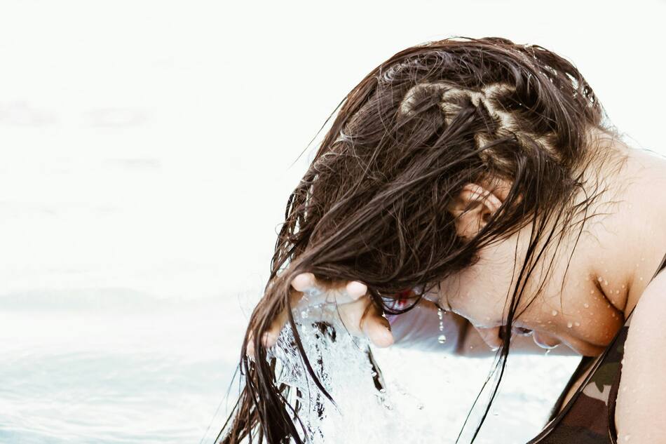 Lavado de pelo. Fuente: Pexels