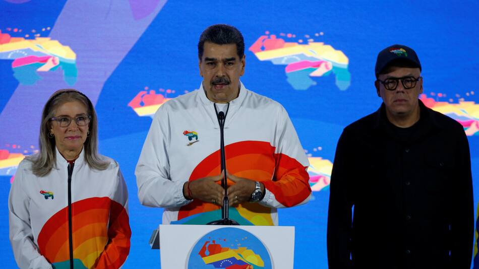 Nicolás Maduro, su esposa y su hijo. Foto: Reuters.