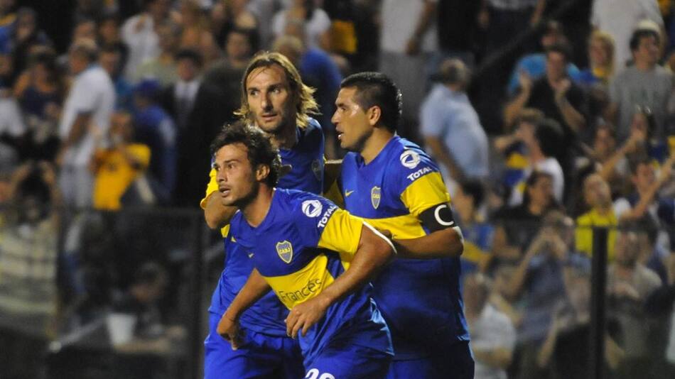 Rolando Schiavi y Juan Roman Riquelme, Boca Juniors, NA.