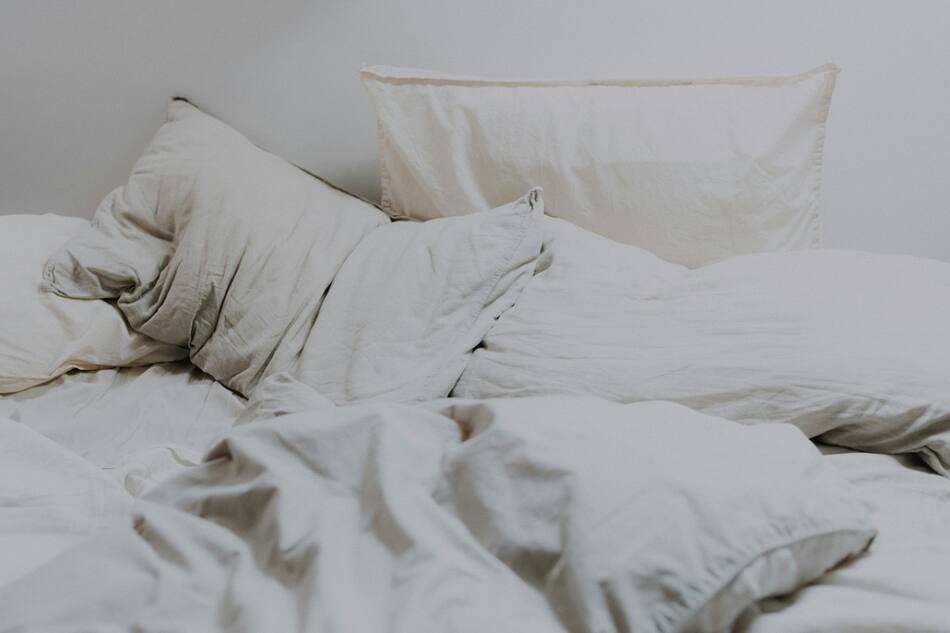 Cama; colchón; almohada. Foto: Unsplash.