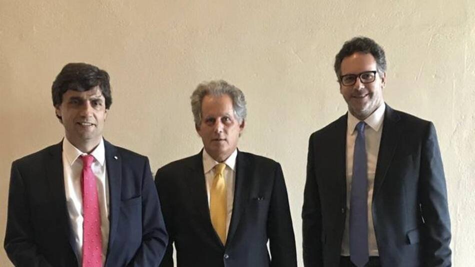 Hernán Lacunza y Guido Sandleris con David Lipton, AGENCIA NA