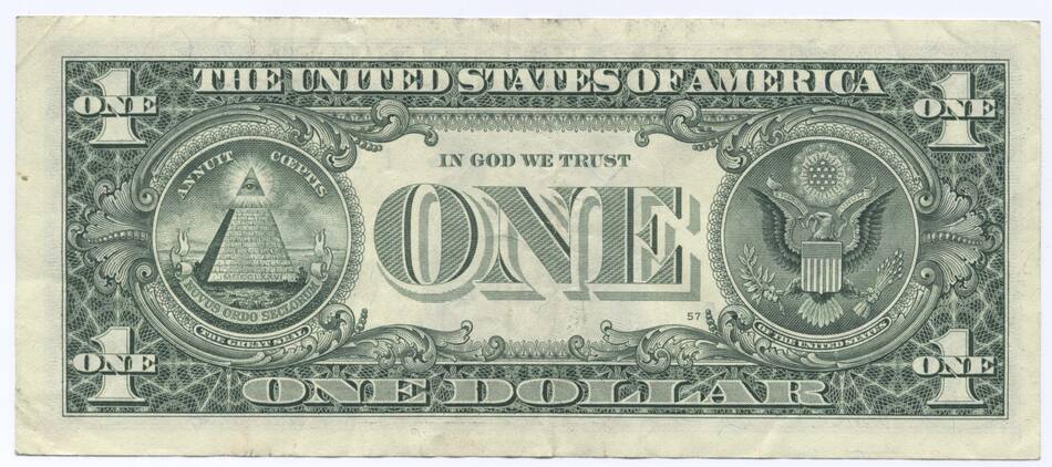El reverso de un dólar convencional.
