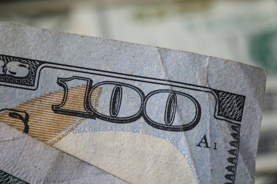 Billetes de 100 dólares. Foto: Unsplash.