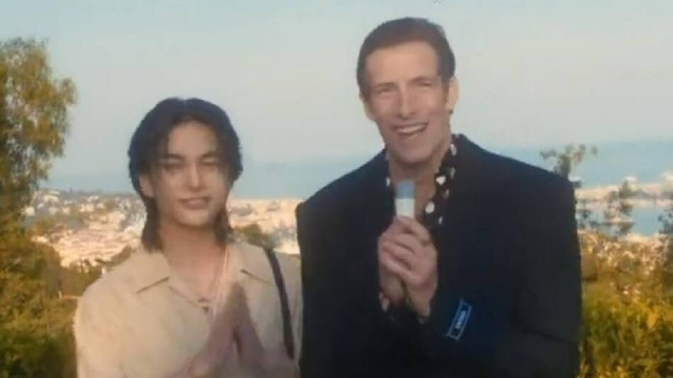 Iván de Pineda junto al rapero surcoreano. Foto: captura.